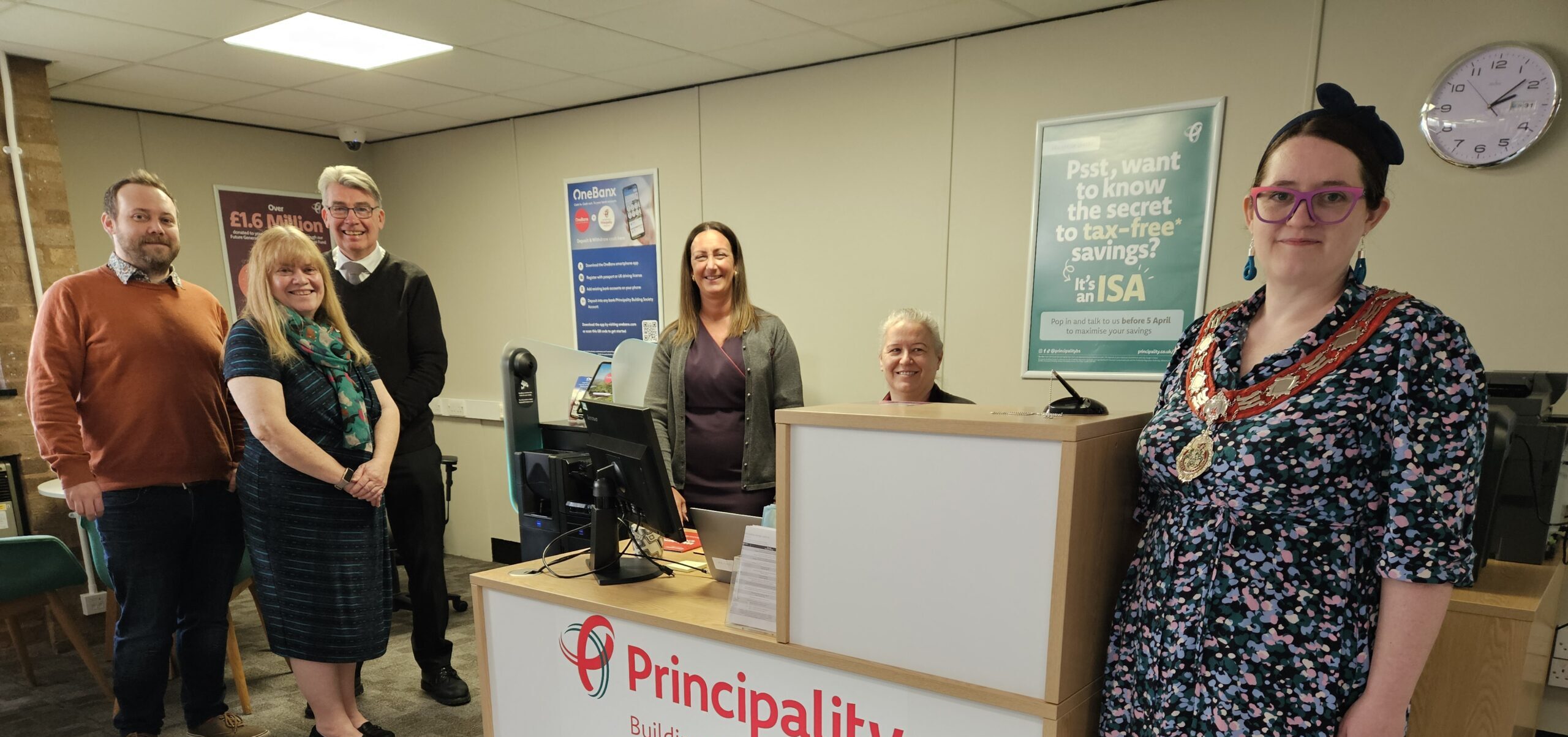 From left to right Cllr Dan Rose, Cllr Carolyn Preece, local business owner Phil Jones from Bistre Farm Shop Area Manager and Buckley branch staff Kim and Buckley Town Mayor Cllr Emma Preece